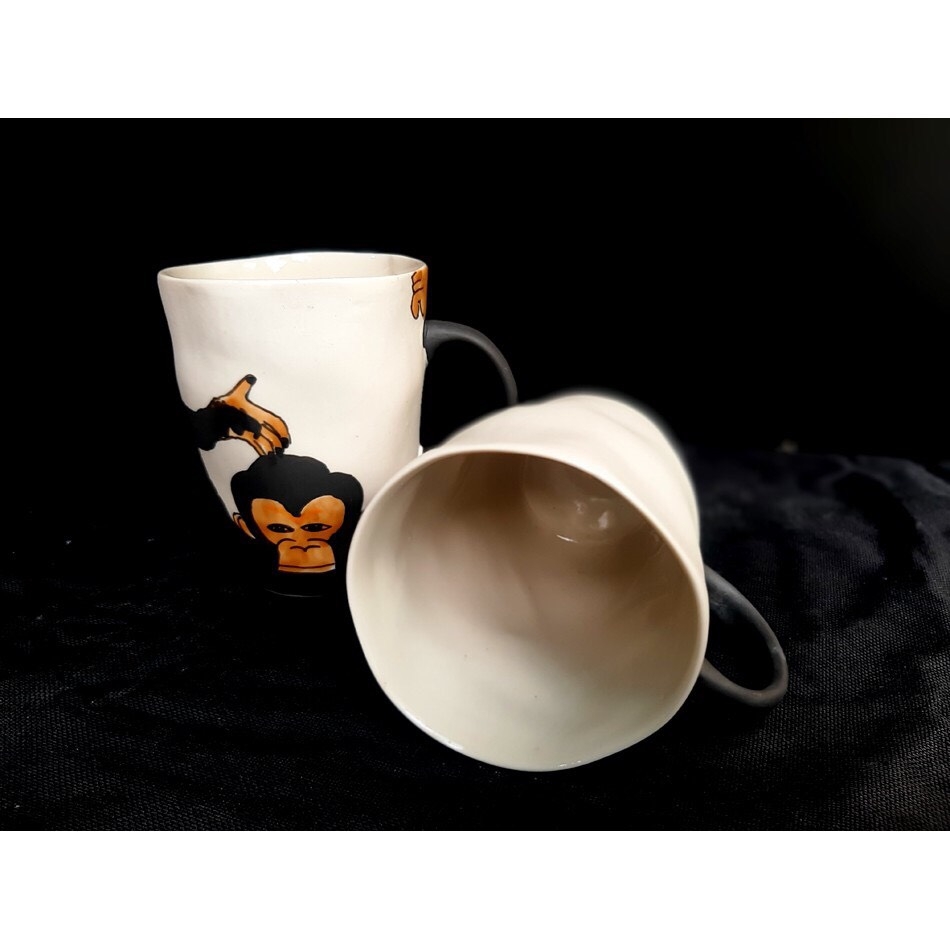 Cup with distorted drawing of expressive monkey- Gia Oanh Authentic Bat Trang